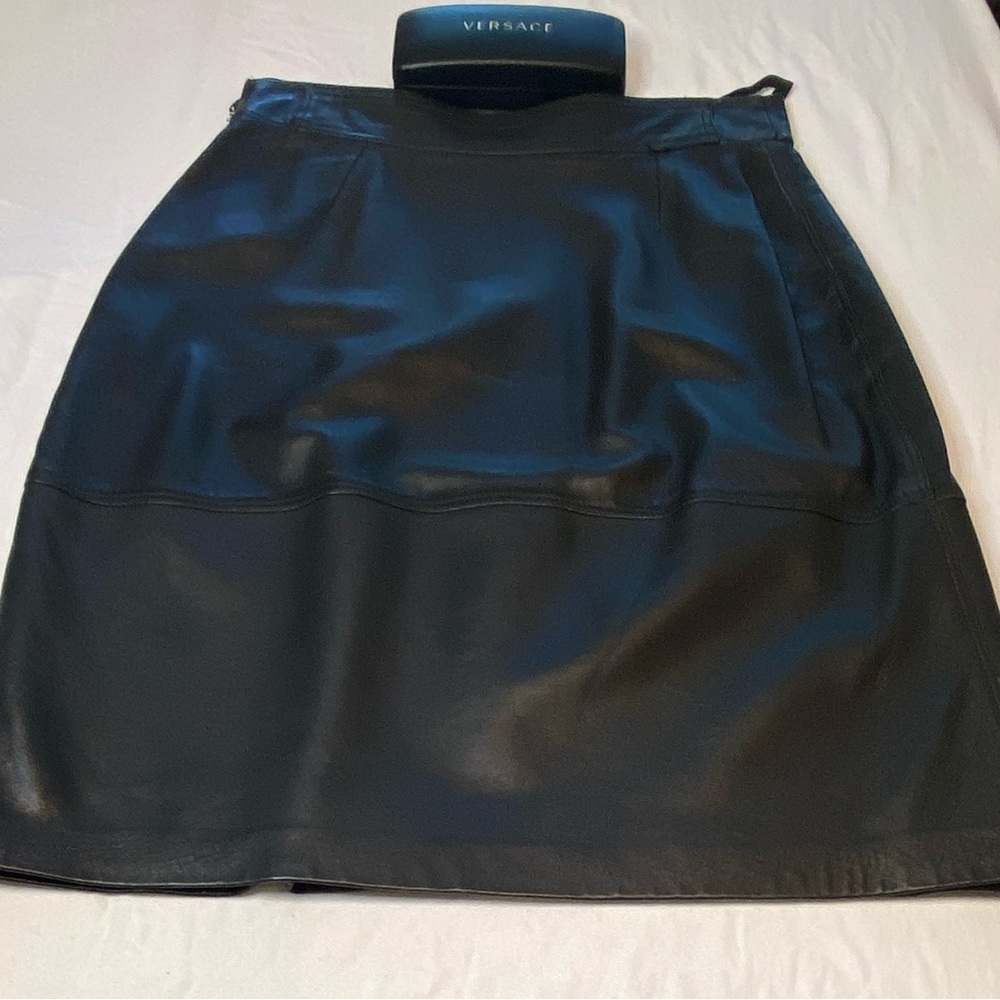 Vintage Versace black leather skirt. One of a kind piece. Exquisite stitching